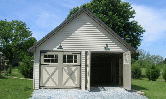 2-Car garage with farmhouse style doors