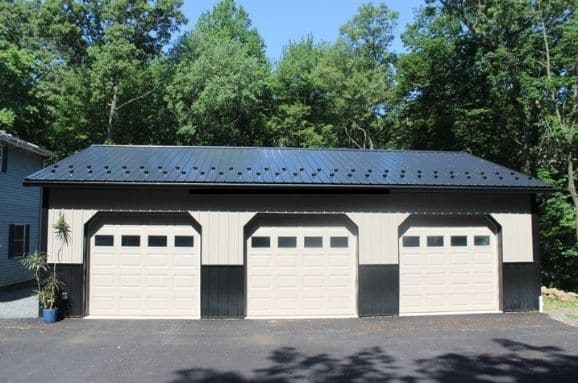 Pole barn garage with best snow guards on roof