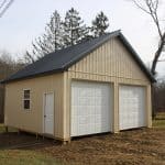 yellow and black 24x24 2-car garage with white doors for sale in glenmoore pa