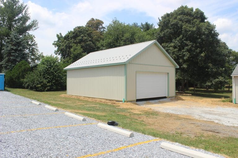 parking lot with a 24x34 2-car garage with attic for sale in manheim pa in the background