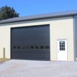 white door and black garage door on a 28x32 workshop for sale in new holland pa