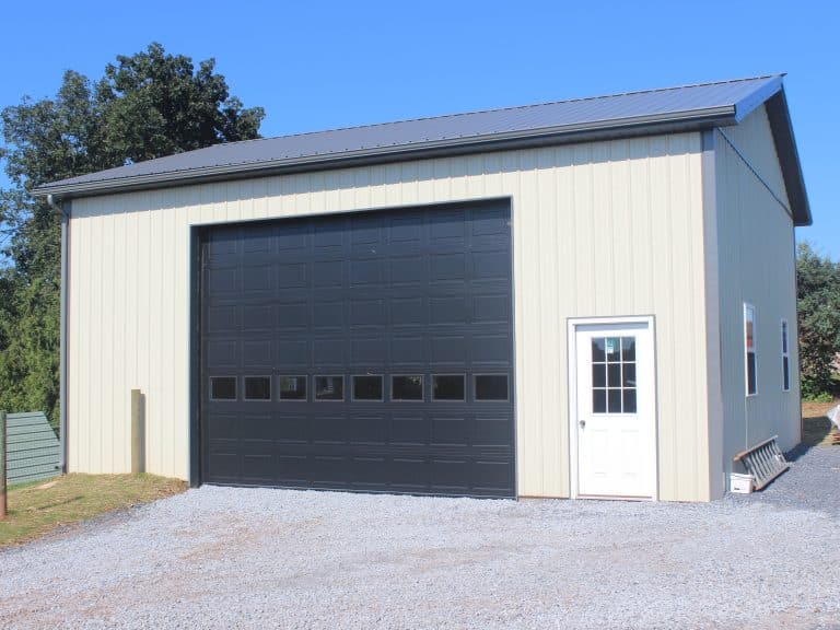 white door and black garage door on a 28x32 workshop for sale in new holland pa