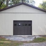 front view of a 30x40 workshop with porch and garage door for sale in reading pa