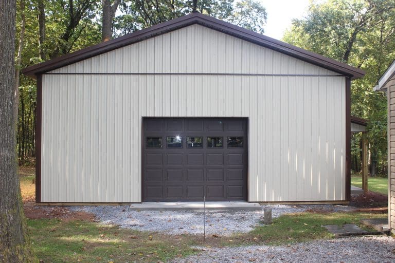 front view of a 30x40 workshop with porch and garage door for sale in reading pa
