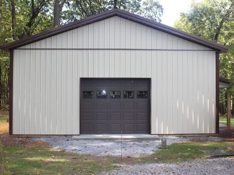 front view of a 30x40 workshop with porch and garage door for sale in reading pa