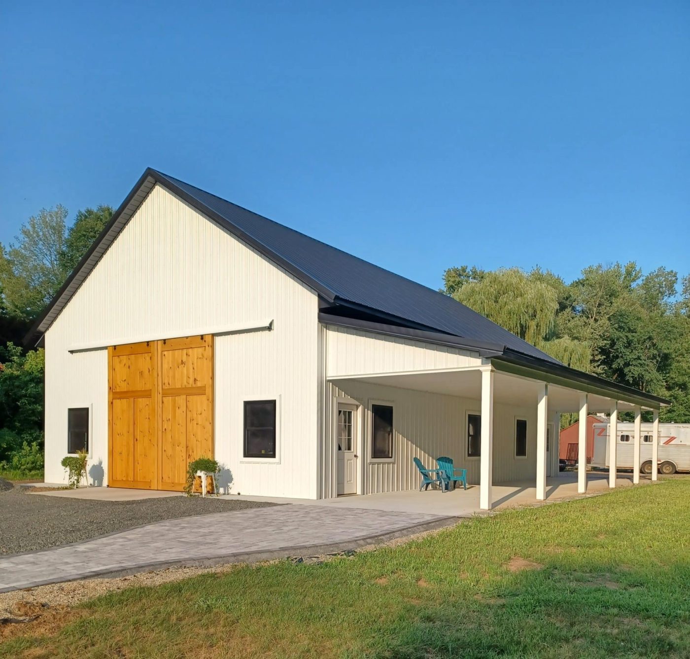 32x52x14 custom pole barn barn with white 27 guage metal siding and black metal roofing available for custom order in massachusetts