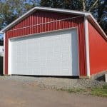 front of a white and red tractor shed for sale in pa