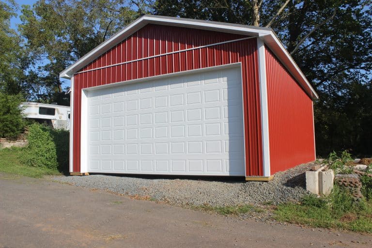 front of a white and red tractor shed for sale in pa